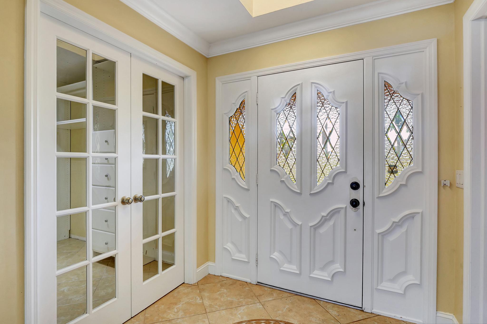 The Front Entry With Office/Flex Room on Left