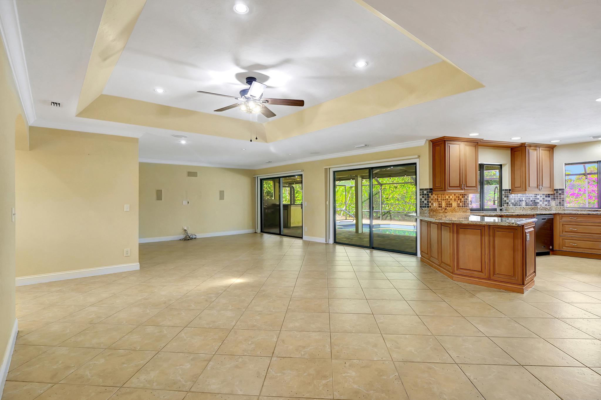 The Family Room, Dining Room and Kitchen Are All Located Within a Large Open Concept Space